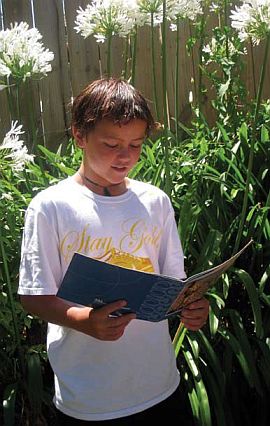Image of boy reading. 