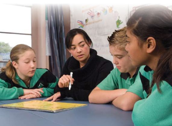 Image of teacher and 3 students. 